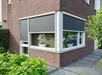 Rits screen geplaatst in hoekwoning